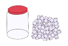 A large, empty cylindrical container and a large quantity (almost as large as the container) of marshmallows next to it.
